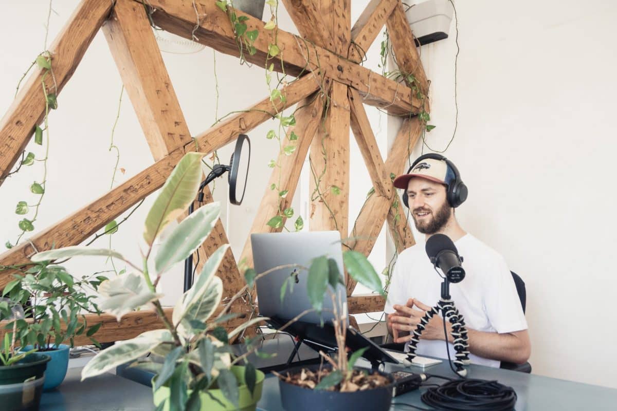 man running a podcast